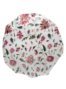 A shower cap with colorful floral print, made of waterproof fabric, worn by a person viewed from the back.