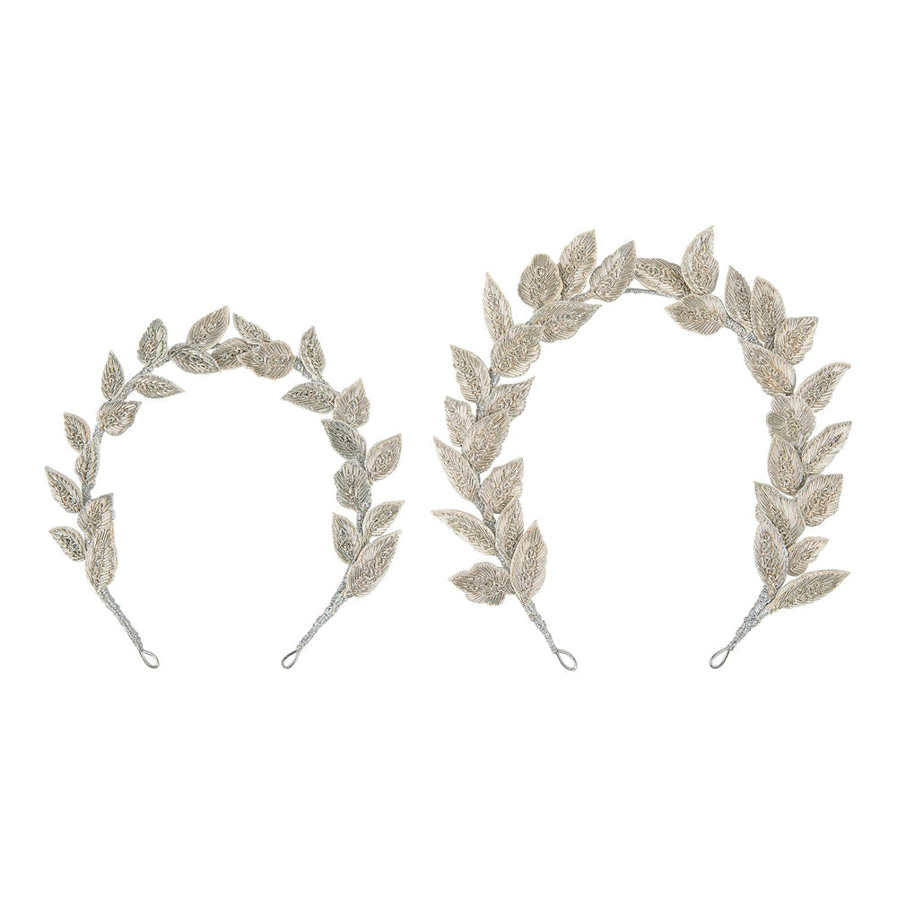 Front view of two Charlotte Crown headbands with silver hand-embroidered leaves and flexible wired bases on white background