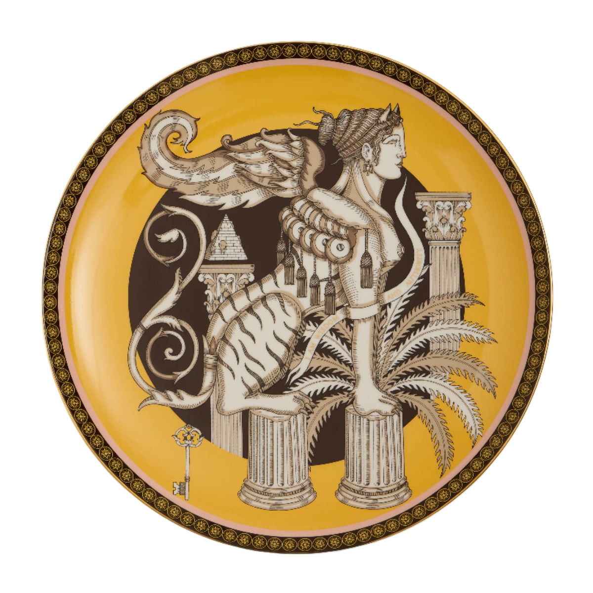 Top view of The Sphynx saffron decorative plate showing sphinx motif, palm fronds, and 18K gold rim on white background