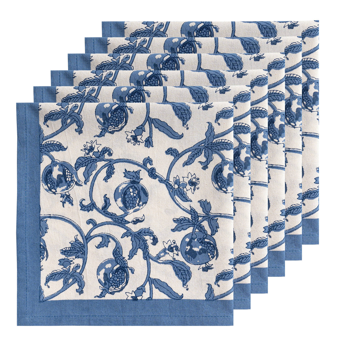 Close-up of Granada Napkins Cornflower Blue, Set of 6 showcasing blue fruit and floral print on white cotton fabric