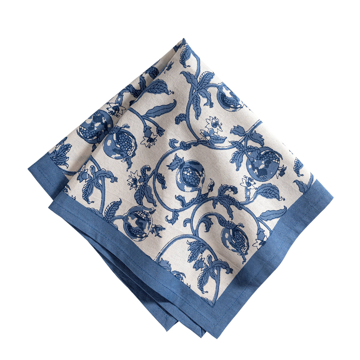 Close-up of Granada Napkins showcasing cornflower blue grape and leaf pattern with blue borders on white background