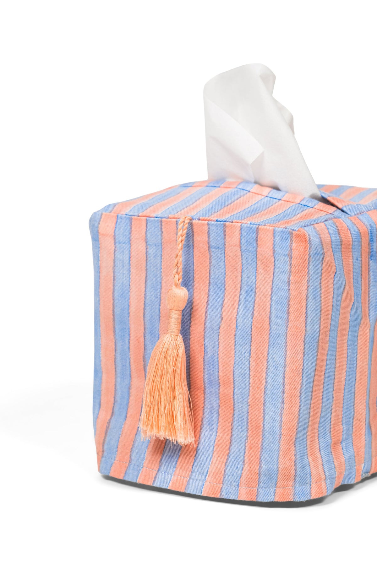 Close-up of striped blockprint tissue box cover with decorative tassel