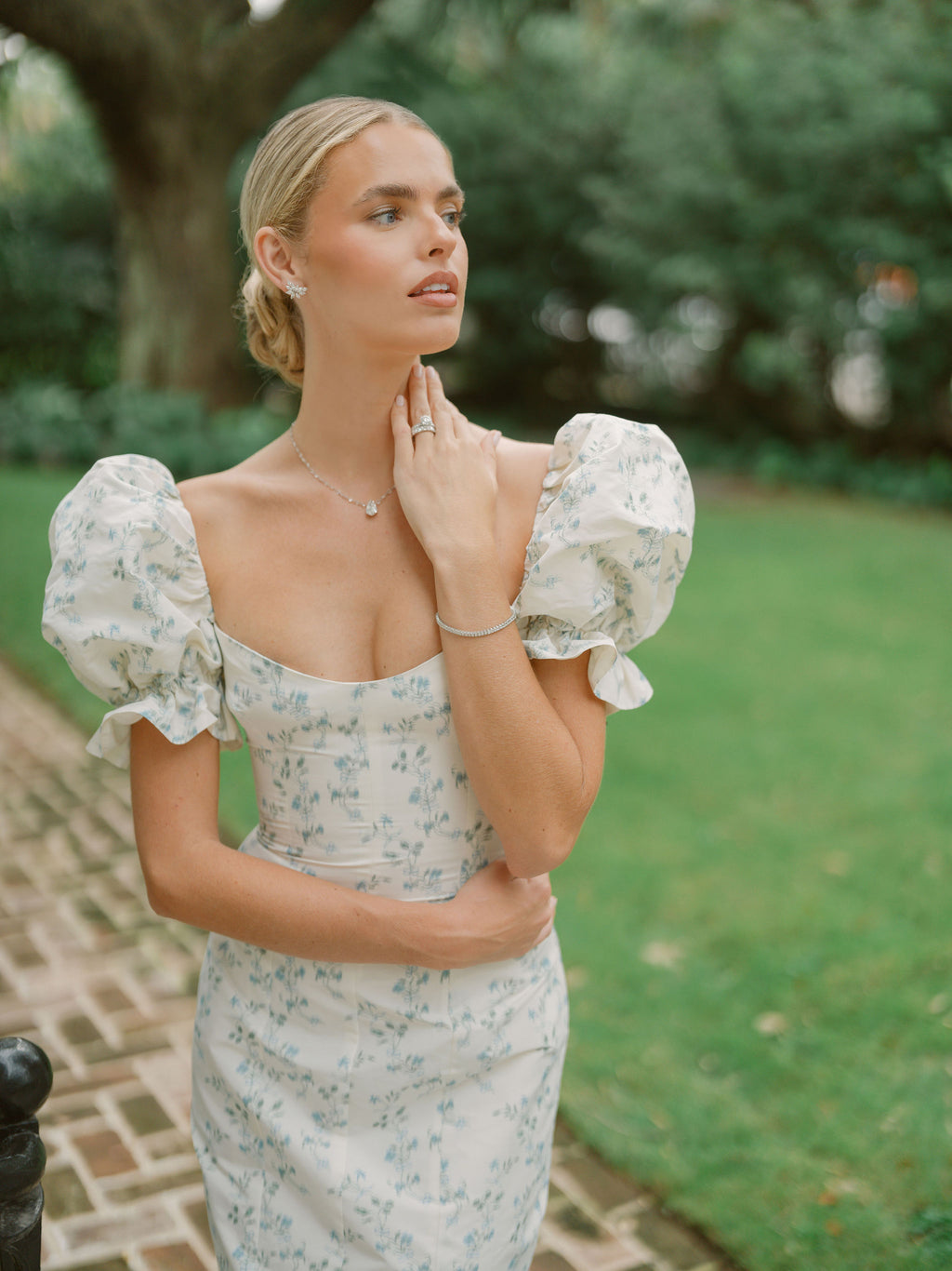 OTM Exclusive: Isidore Blue Bow Floral Ikat Puff Sleeve Column Gown | Over The Moon OTM Exclusive: Isidore Blue Bow Floral Ikat Puff Sleeve Column Gown | Over The Moon