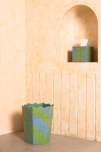 Green and blue striped blockprint tissue box set displayed against warm-toned wall
