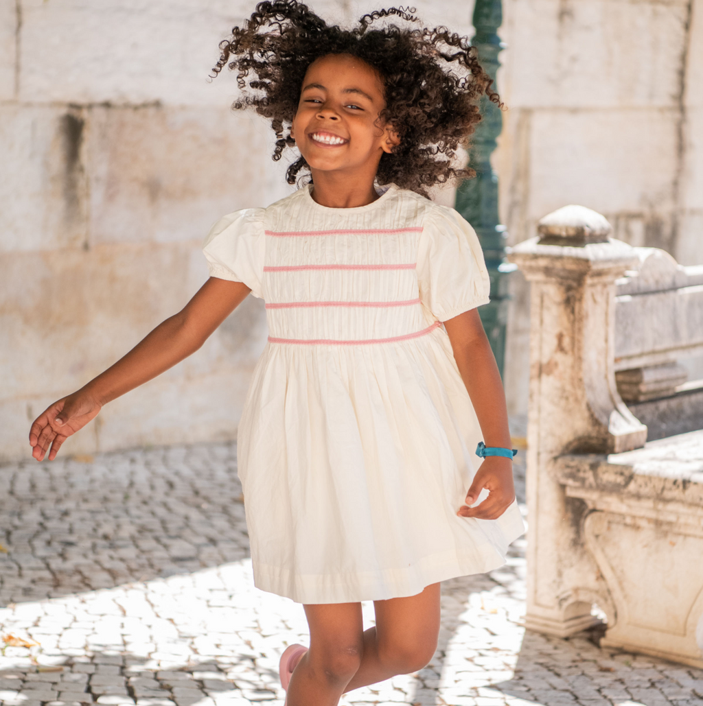 Girls Cream Smocked Puff Sleeve Dress | Over The Moon Girls Cream Smocked Puff Sleeve Dress | Over The Moon