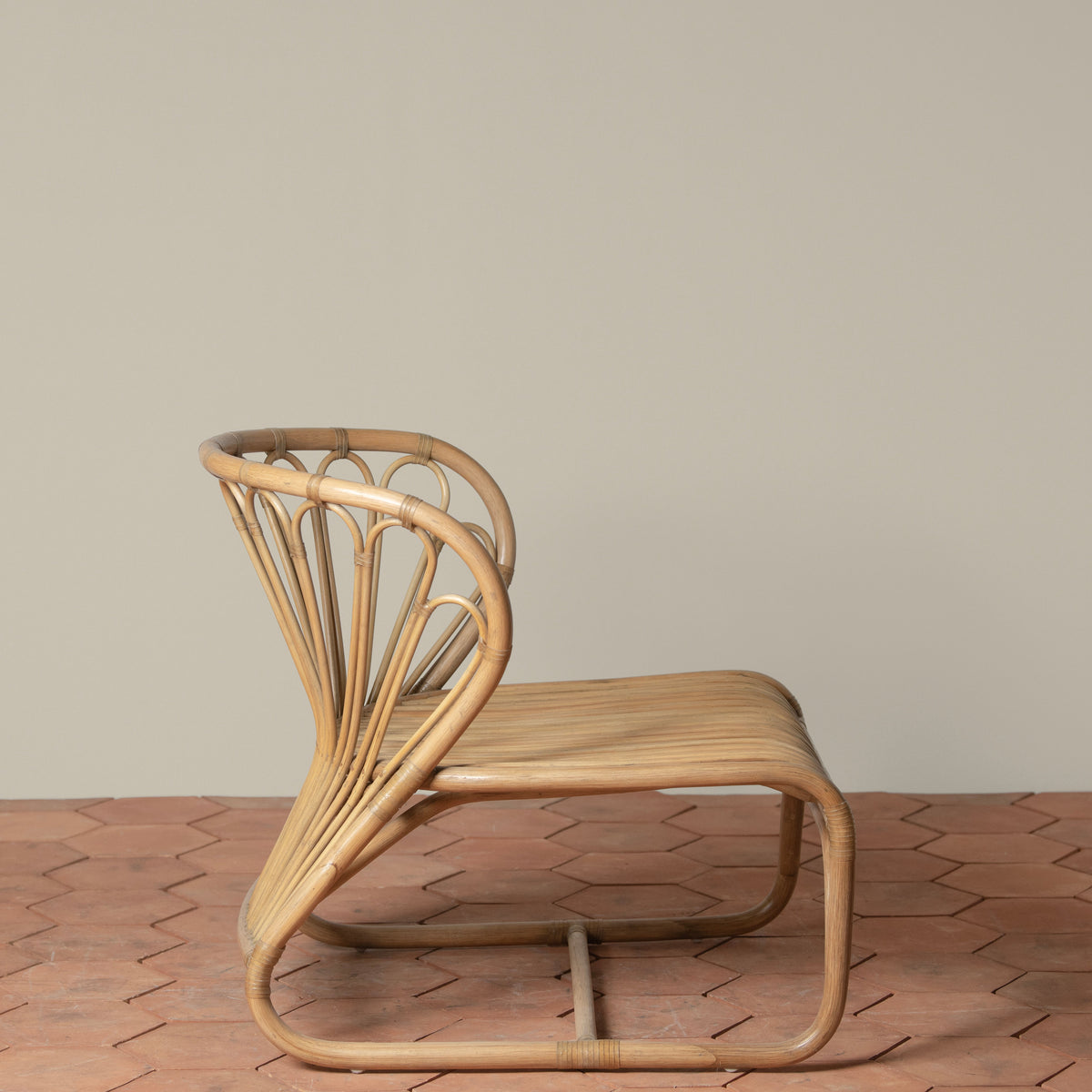 coste rattan lounge chair side