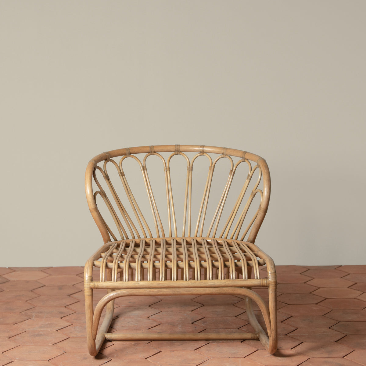 coste rattan lounge chair front
