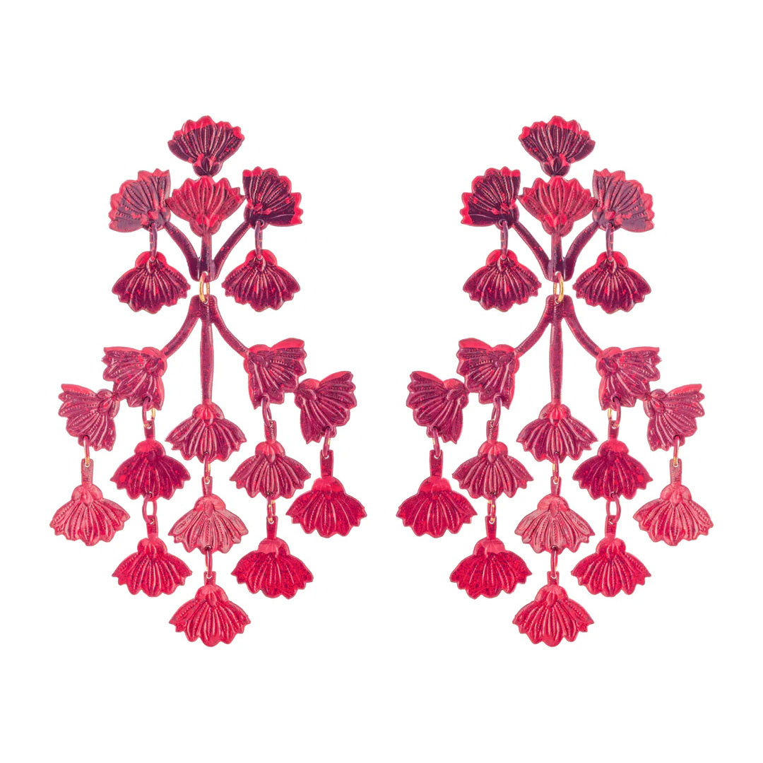 Front view of Sunset Mimosa earrings showcasing cascading hand-painted blossom charms in sunset red and pink on white background