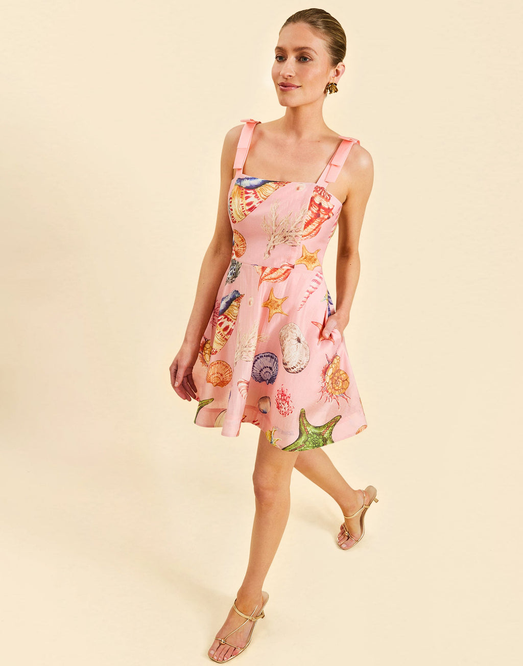 Darling Convertible Midi Dress in Seashell Symphony linen with strappy bodice, removable tiers, and convertible midi-to-mini silhouette.