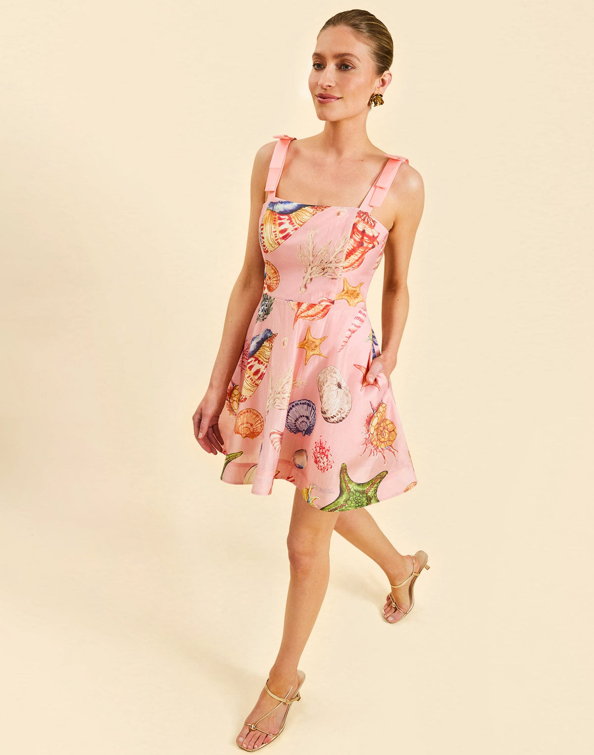 Darling Convertible Midi Dress in Seashell Symphony linen with strappy bodice, removable tiers, and convertible midi-to-mini silhouette.