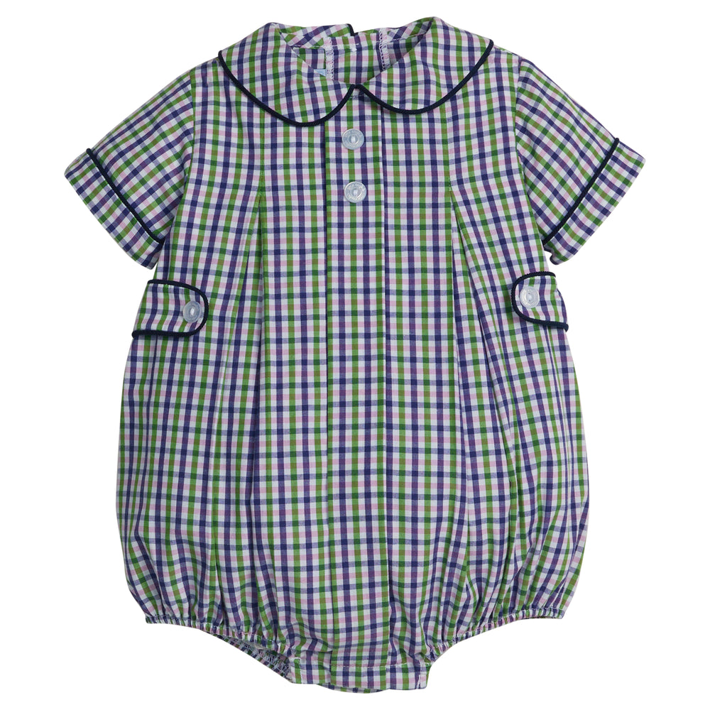 Front view of Davant Bubble romper in Coventry plaid with Peter Pan collar, navy piping, and button tabs on white