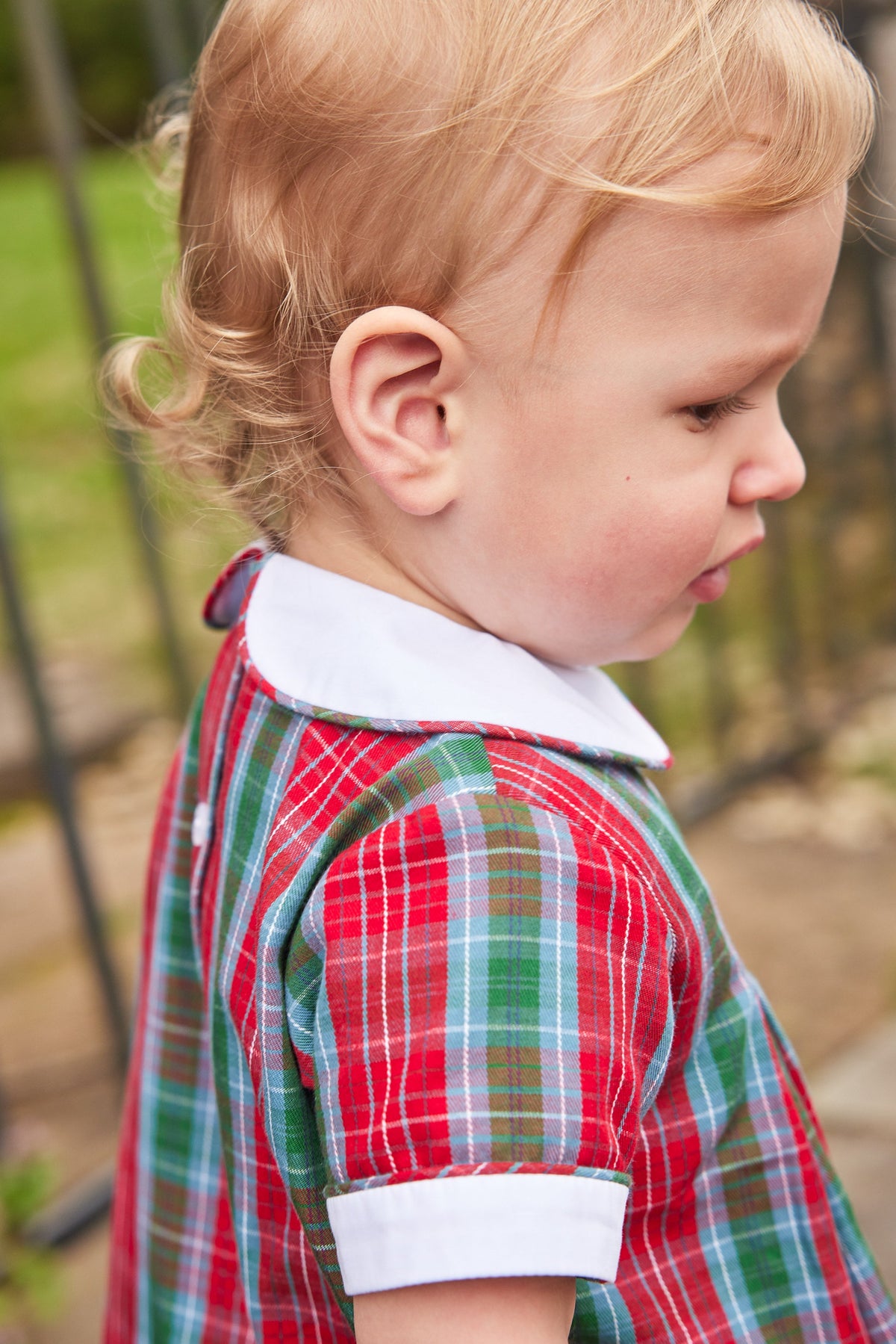 Little English traditional clothing, davant bubble in red, green, and blue highlands tartan pattern with buttons on chest for baby boy 