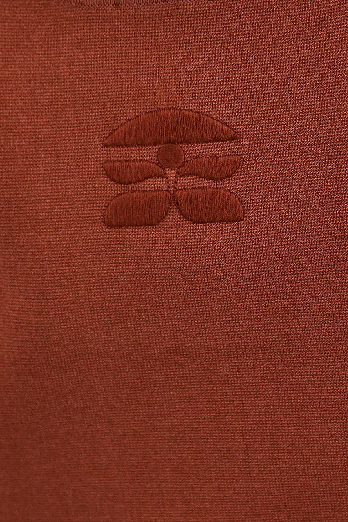 Close up of the back of the Davis Cami with the subtle HB logo. 