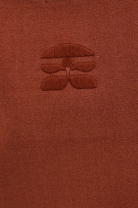 Close up of the back of the Davis Cami with the subtle HB logo. 