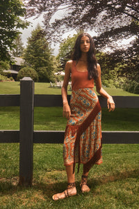 The Allyne Skirt in Amber Glen Brown paired with Davis Cami in Rust and matching scarf. 