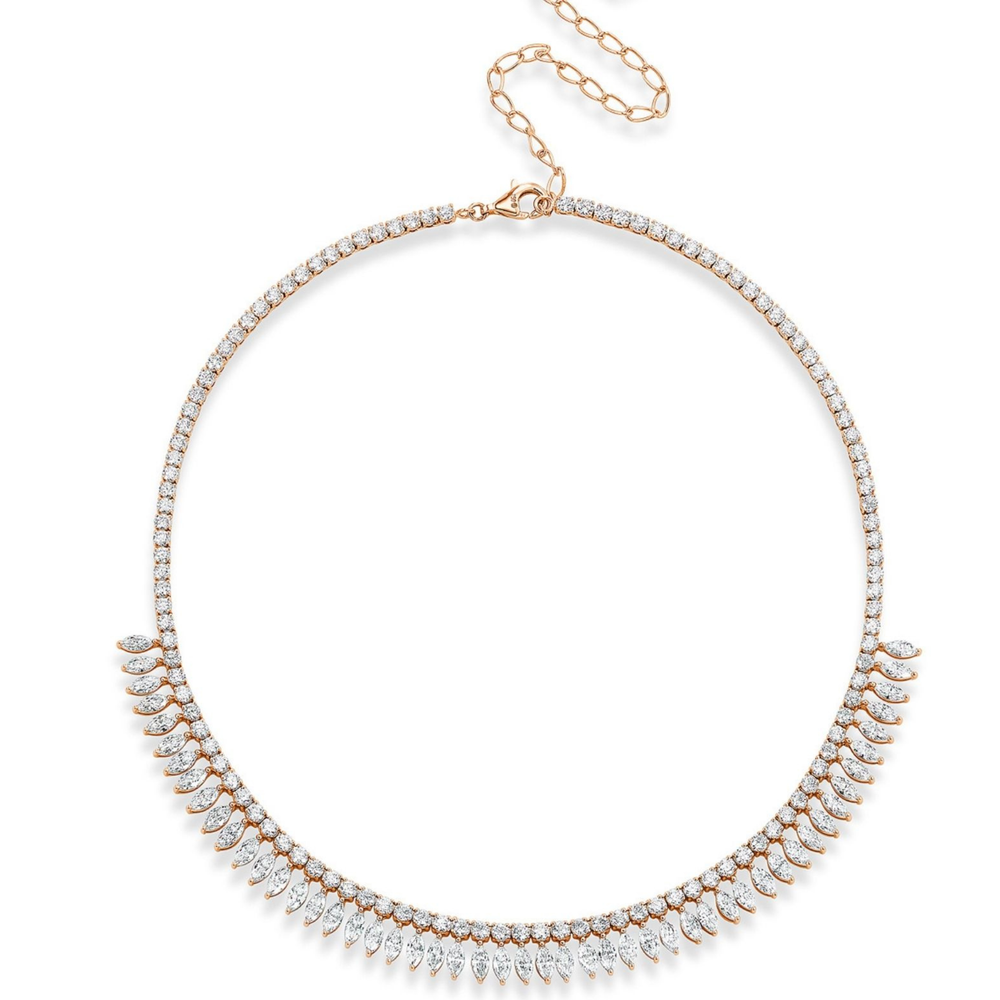 The Deco Feather Collar Necklace features marquise diamonds, teardrop-shaped diamond clusters, and a row of round diamonds on the front. Crafted in 18k white and rose gold, it has an adjustable chain with a lobster clasp.