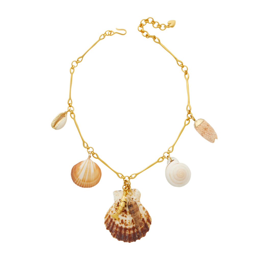 Front view of Del Mar Necklace with 24K gold-plated chain and hanging natural shells and fish charms on white background