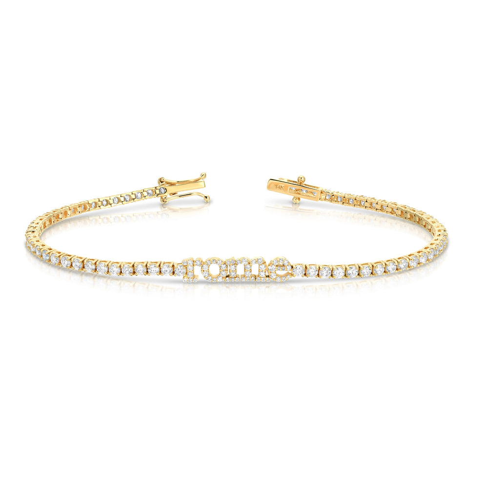 Top-down view of Custom Name Tennis Bracelet in 14k yellow gold featuring rome spelled in diamonds and a line of round diamonds on white background