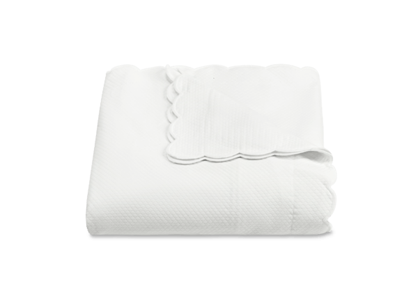Front view of folded Diamond Pique duvet showing scalloped edge and diamond pique texture on white background
