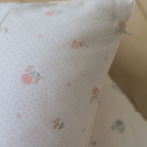 Close up of toddler pillow in Ditsy Floral - Pink.
