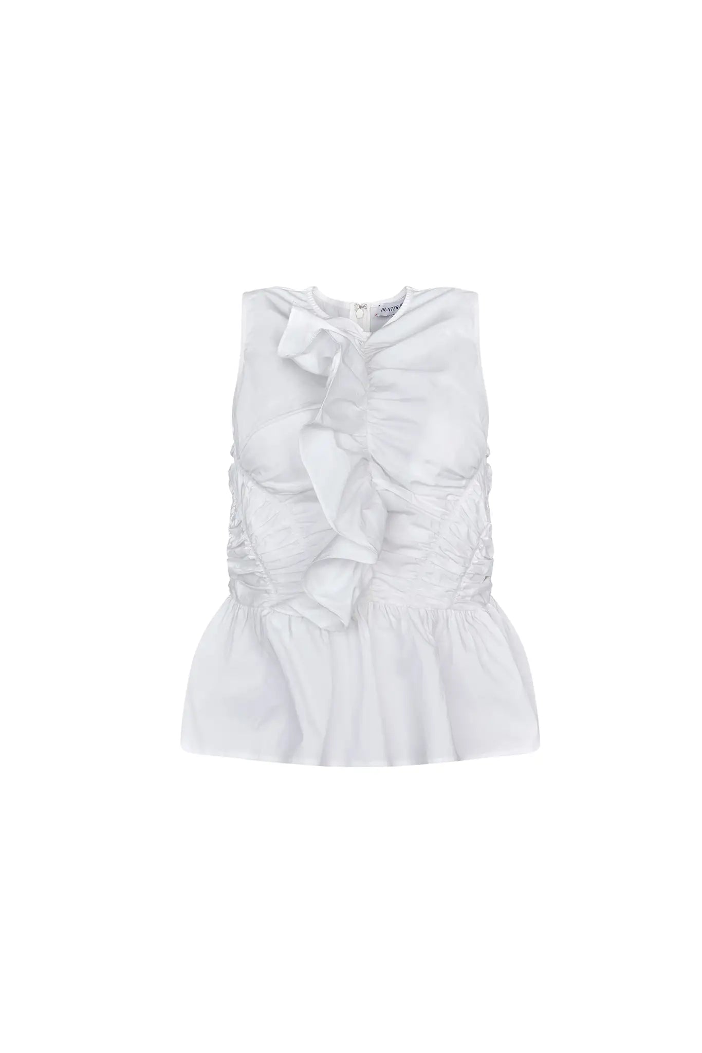 The Doering Top is a fitted V-neck silhouette with ruffles, shirring, and a peplum waist. 