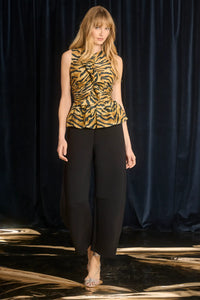 Duvall Pant is a five-pocket jean and holds a barrel-leg shape with a front fly, zipper and button.