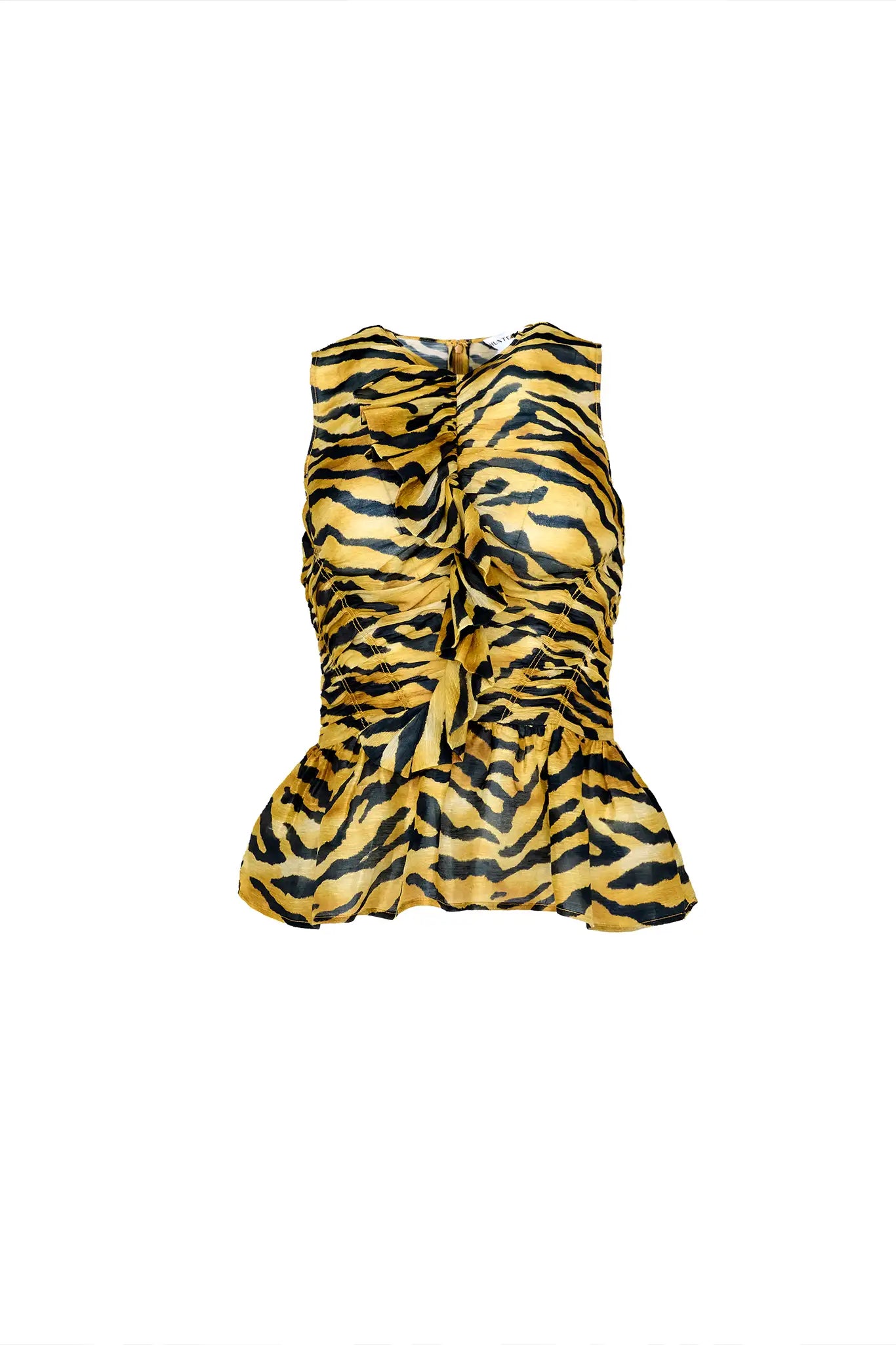 The Doering Top is a fitted V-neck silhouette with ruffles, shirring, and a peplum waist. 