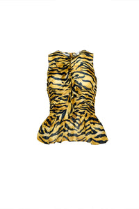 The Doering Top is a fitted V-neck silhouette with ruffles, shirring, and a peplum waist. 