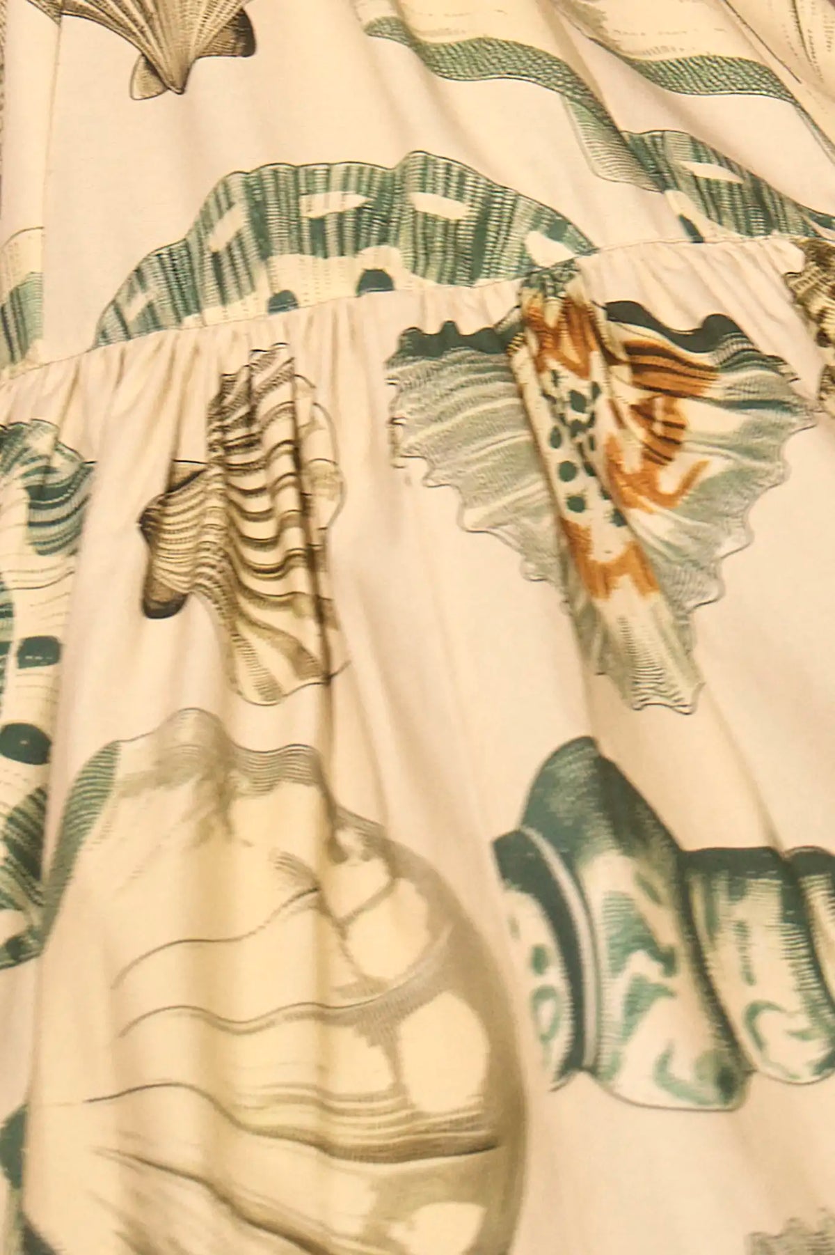 Close up of The Dolly Dress in Somers Shell Cream.