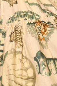 Close up of The Dolly Dress in Somers Shell Cream.