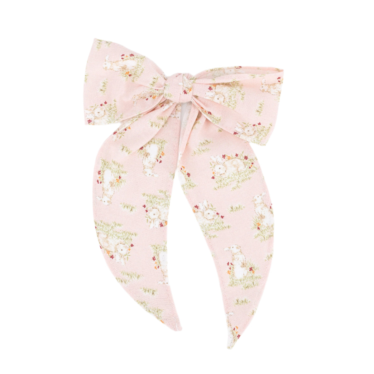 Top view of the Anna Bow showcasing pink floral fabric and long tie tails on a white background