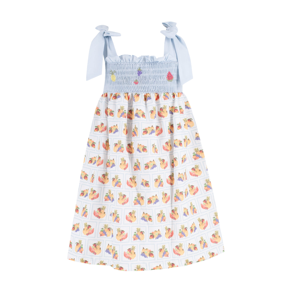Front view of Tropicale Girl Dress showcasing hand-smocked fruit chest and fruit print with white background