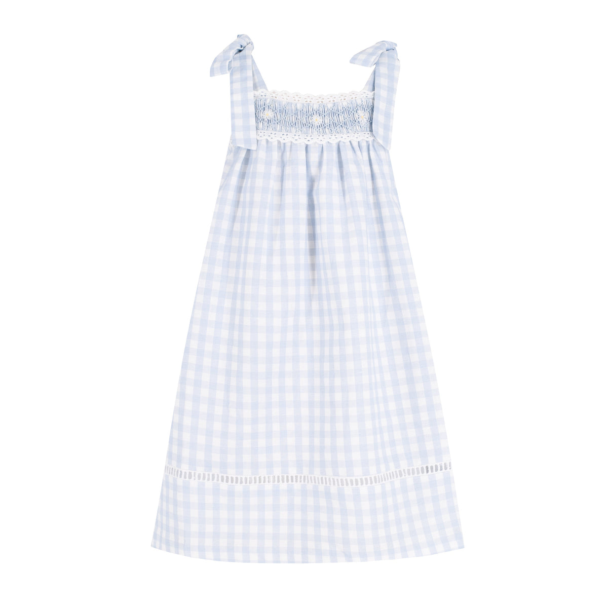 Front view of Gerbera Girl Dress in Spanish linen showcasing blue and white gingham, eyelet trim, and contrast pocket