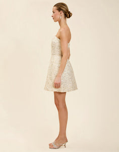 Dottie Mini Dress in Sugar Swizzle with beaded linen organza, strapless neckline, structured bodice with boning, and bell-skirt mini silhouette.