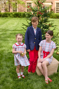 Little English classic children's clothing. Girls A-line Cora Dress in red and green plaid with red bow and red piping detail for the holidays.  Boys Douglas Plaid button down shirt with red corduroy pants and navy wool blazer. Toddler girls Eleanor Dress - Douglas Plaid with ruffled peter pan collar and tie sash in back. 