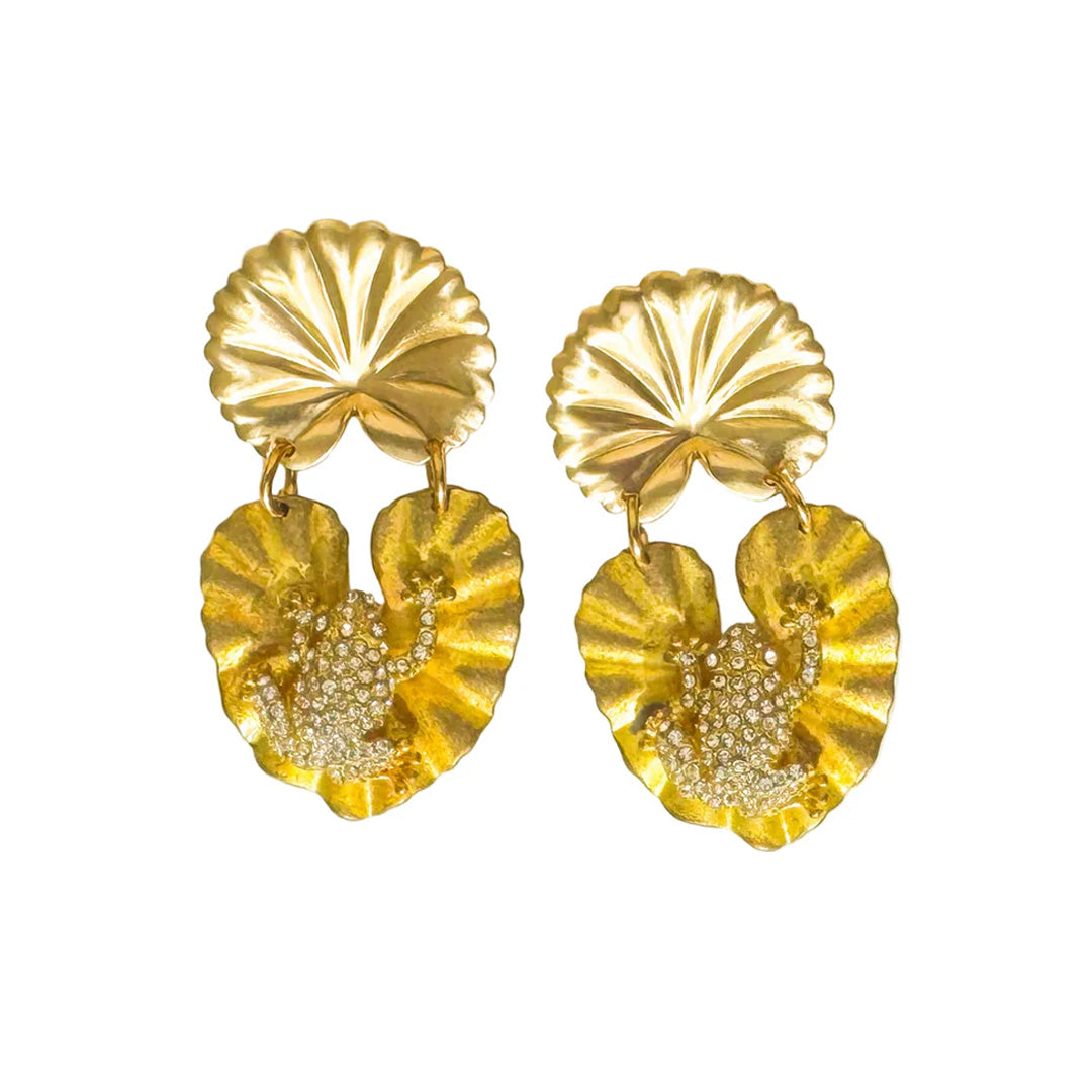 Front view of Rana earrings with gold-tone lily pad drops and sculptural frog accents set with crystals on white background