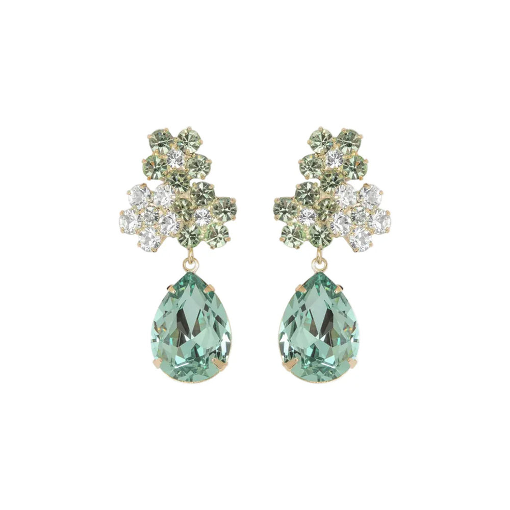 Front view of Lauretta earrings with pear-shaped chrysolite drops and floral crystal cluster on white background