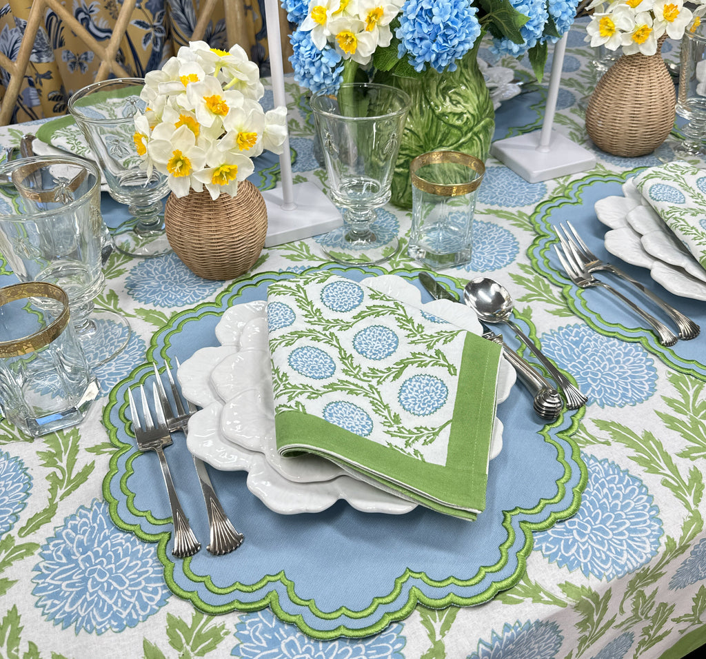 Blue luxury placemat with green embroidery 