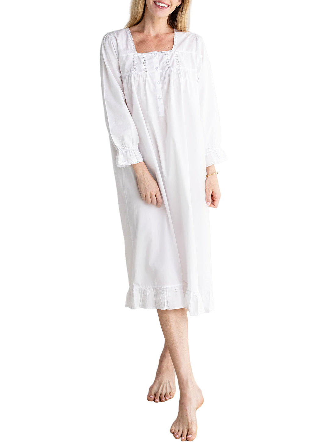 Front of Tessa white cotton nightgown on model with lace-trim square neckline, long sleeves, front buttons, and ruffle hem