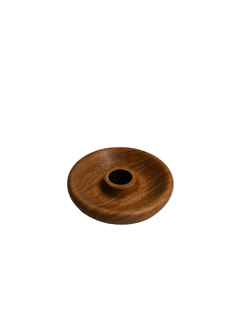 Top view of mesquite wood taper candle holder showcasing built-in wax-catching base on white background