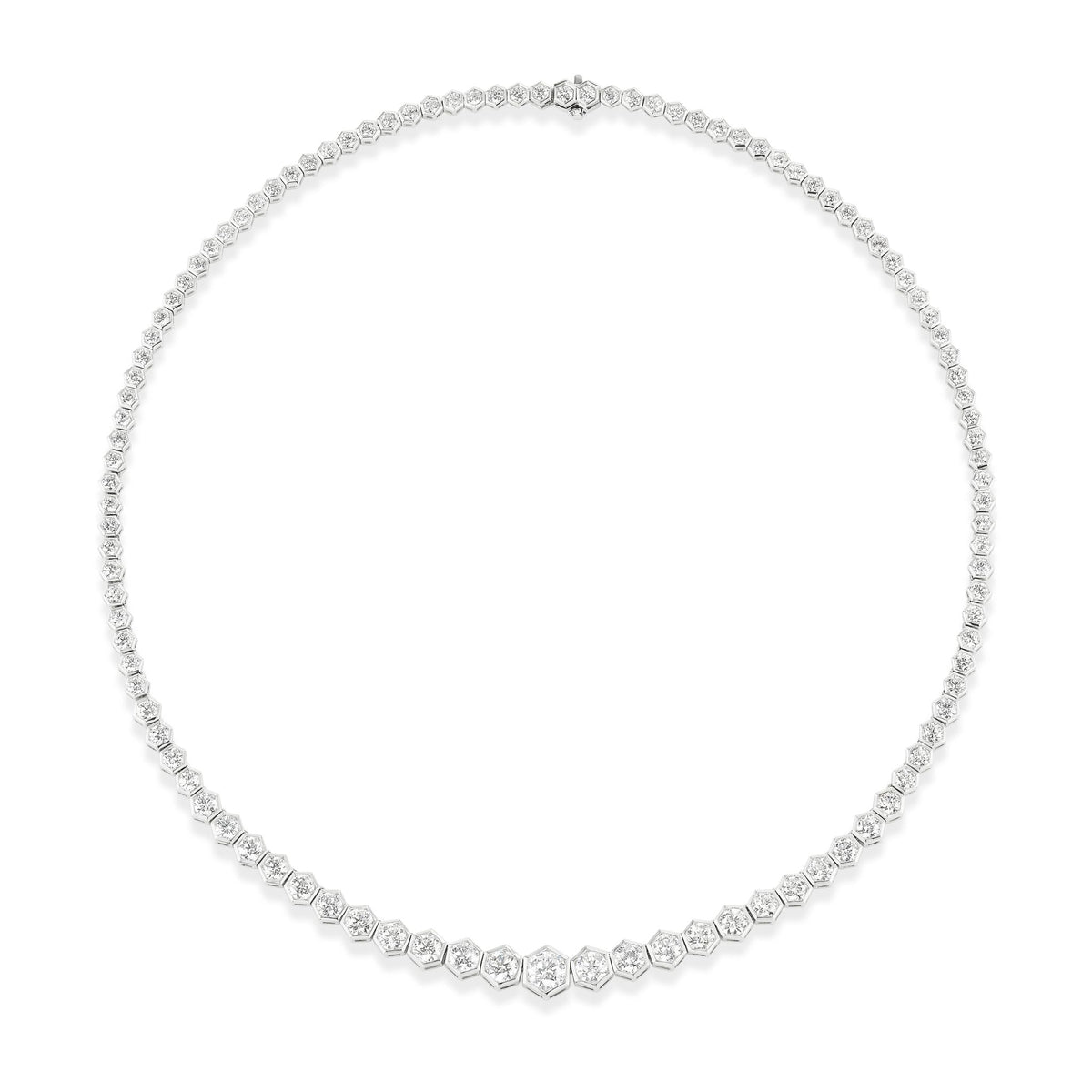 The Graduated Hexagon Bezel Set Round Diamond Tennis Necklace in White Gold features round diamonds set in hexagon bezels along a delicate 18k chain, forming an elegant and classic 16-inch necklace.