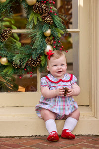 Little English traditional children's clothing.  Puff sleeve and ruffled peter pan collar bubble in red, blue, green, yellow, and white Douglas Plaid with red piping for baby girls for Christmas
