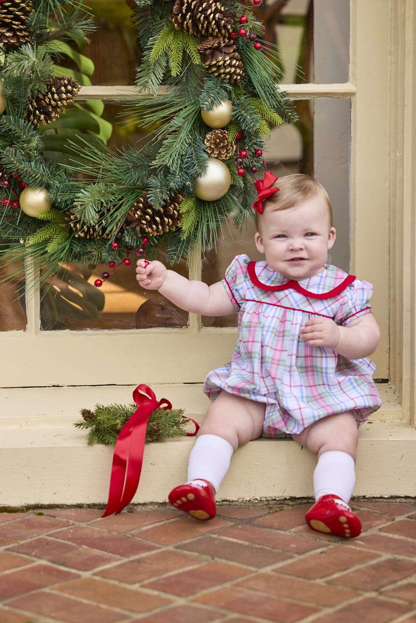 Little English traditional children's clothing.  Puff sleeve and ruffled peter pan collar bubble in red, blue, green, yellow, and white Douglas Plaid with red piping for baby girls for Christmas