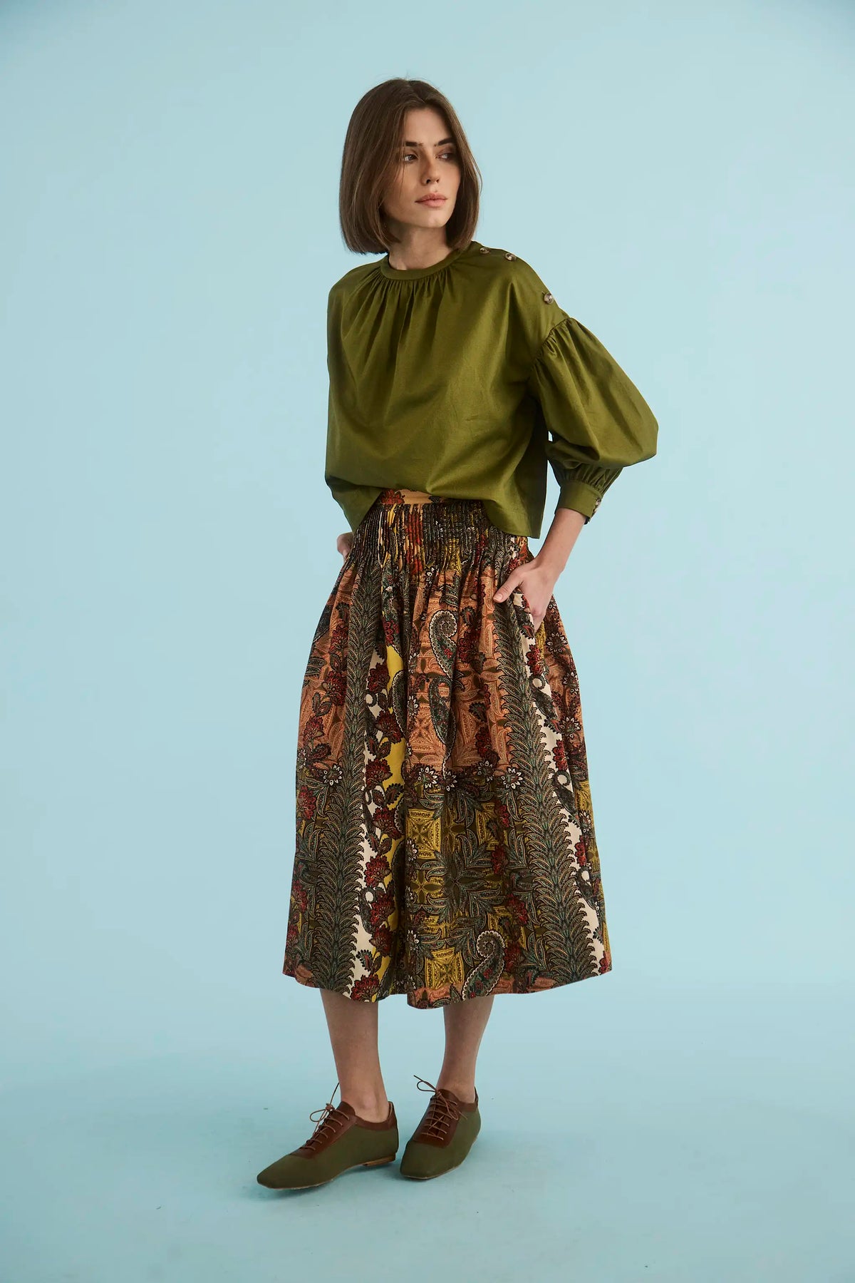 The Eli Top in Pine Grove paired with Fallon Skirt in highland tapestry. 