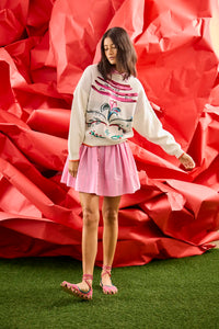 The Elizabeth Sweater is a crewneck with a pull-over design in the anniversary print.