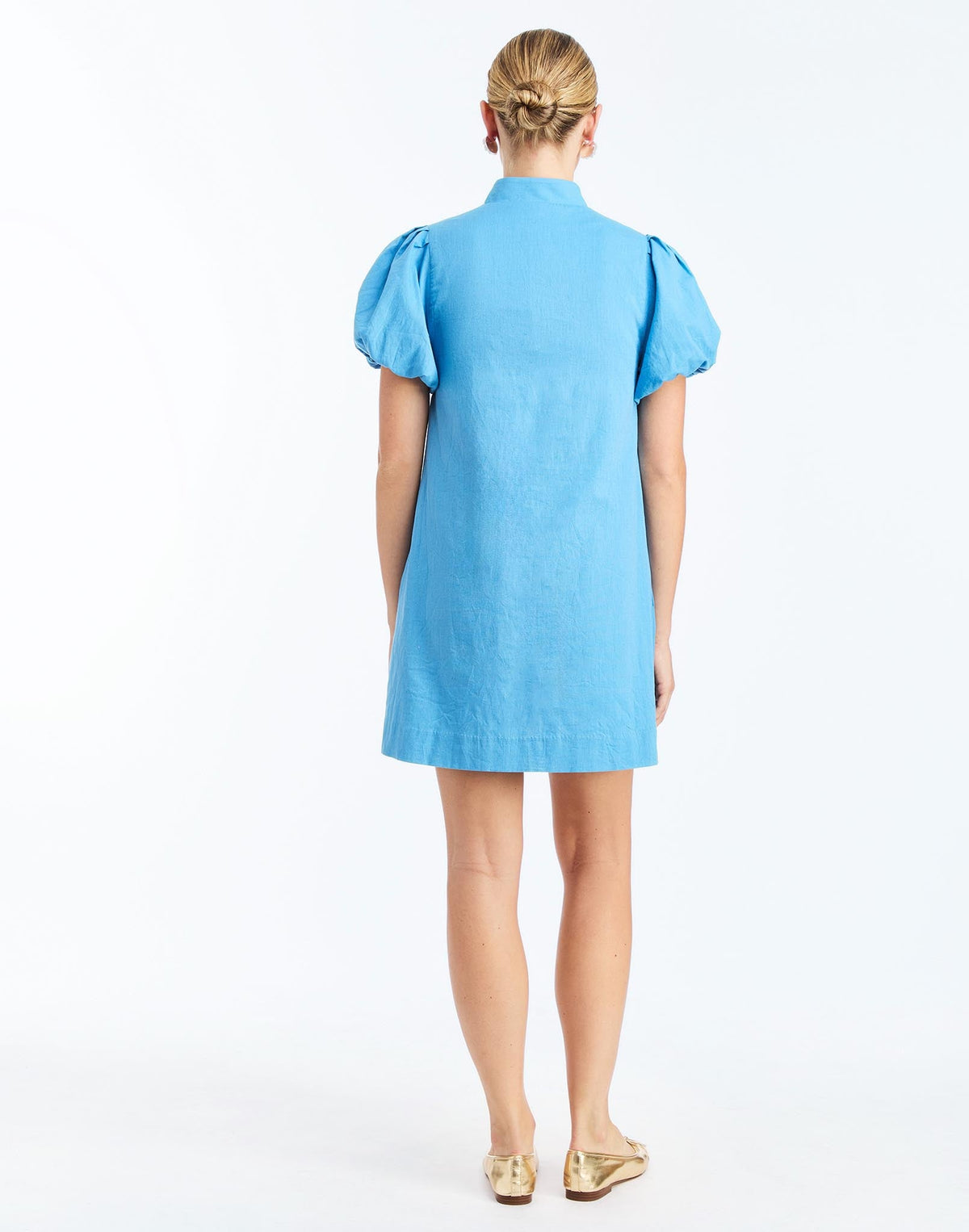 Back - Elliana Mini Dress in Cobalt Blue is an embroidered linen mini with V-neck, puff sleeves, and floral detailing.