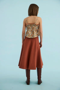 Back of the The Elwood Cami in Gertrude paired with the Joan Skirt in Rust. 