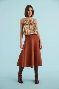 The Elwood Cami in Gertrude paired with the Joan Skirt in Rust. 