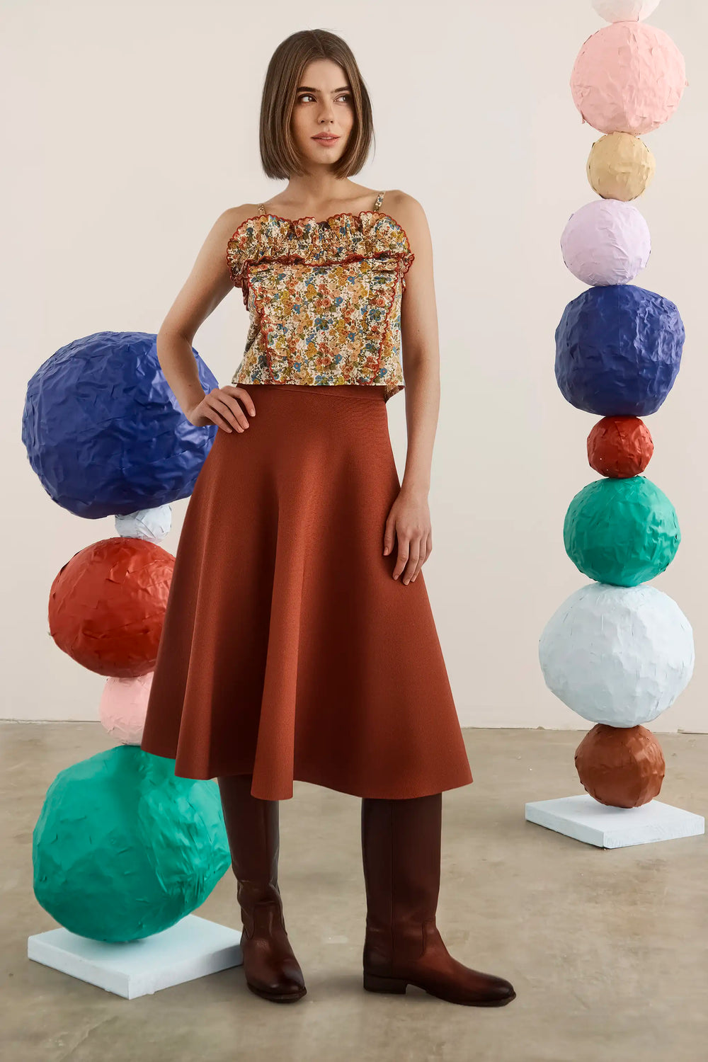 The Elwood Cami in Gertrude paired with the Joan Skirt in Rust. 