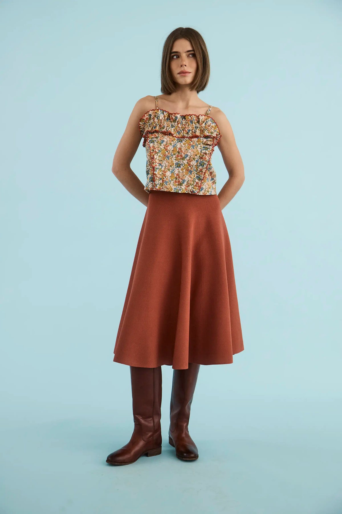 The Elwood Cami in Gertrude paired with the Joan Skirt in Rust. 